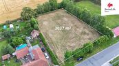 Prodej stavebního pozemku 3037 m2 Měník, cena 4590000 CZK / objekt, nabízí 